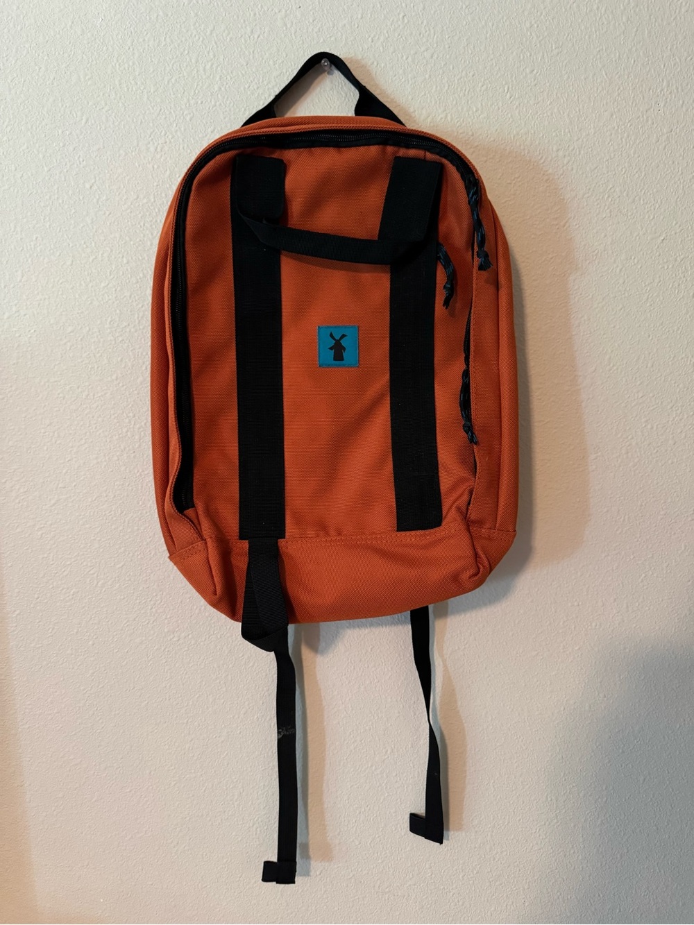 Dutch Bros Orange Canvas Backpack with Black Accents